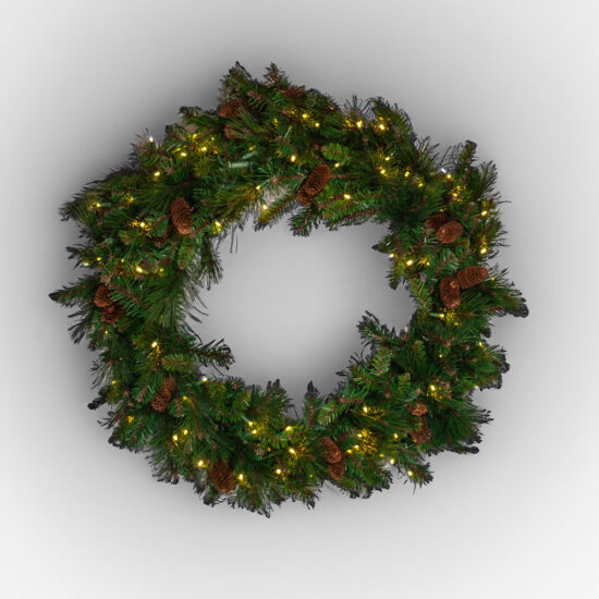 A lush artificial pine wreath decorated with warm white lights and natural pine cones, displayed against a neutral background.