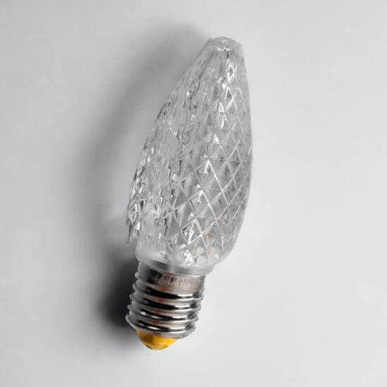 Diamond-cut plastic LED light bulb with a clear, textured cover and a standard screw base.