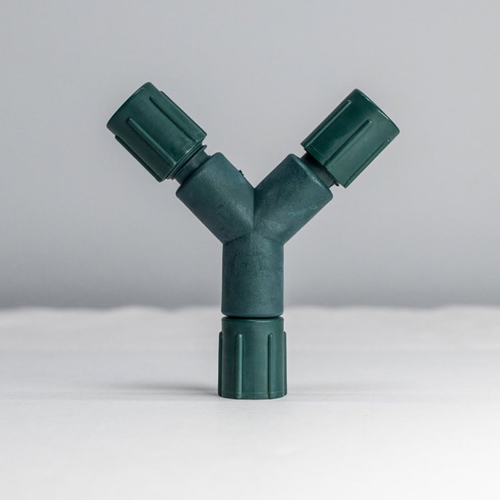 Dark green coaxial "Y-tap" splitter for light string connections, featuring three screw-on waterproof connectors. Coaxial Y Tap Splitter