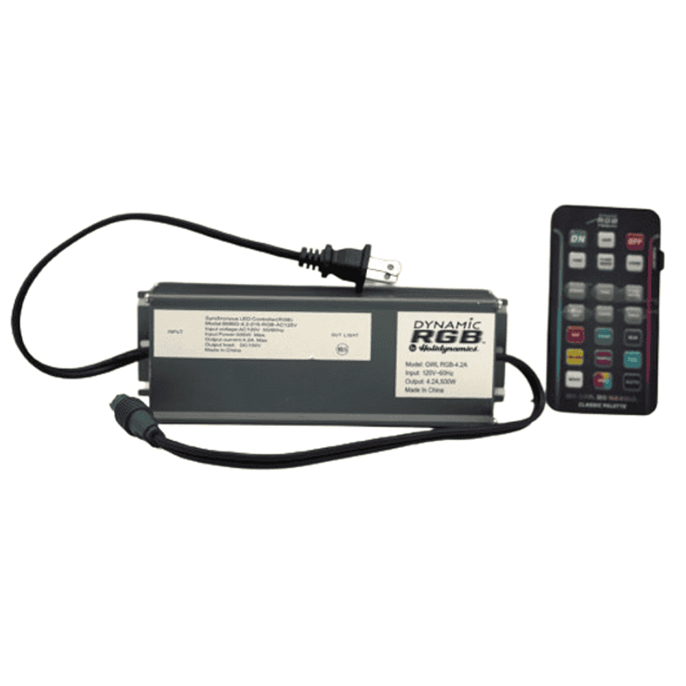 Dynamic RGBWW Controller 500Ct Light Connection. Long, rectangular Dynamic RGB LED controller box with a power plug, light connection, and accompanying remote control.
