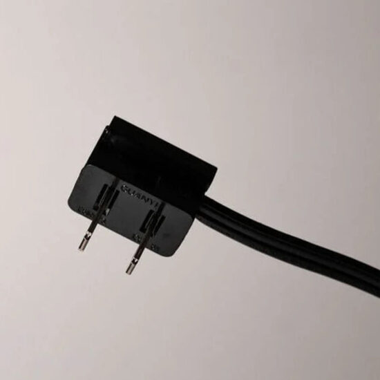 A standard two-prong AC power plug attached to black parallel (zip) cord. The connector is characterized by its slim design and is primarily utilized as the power input terminal.