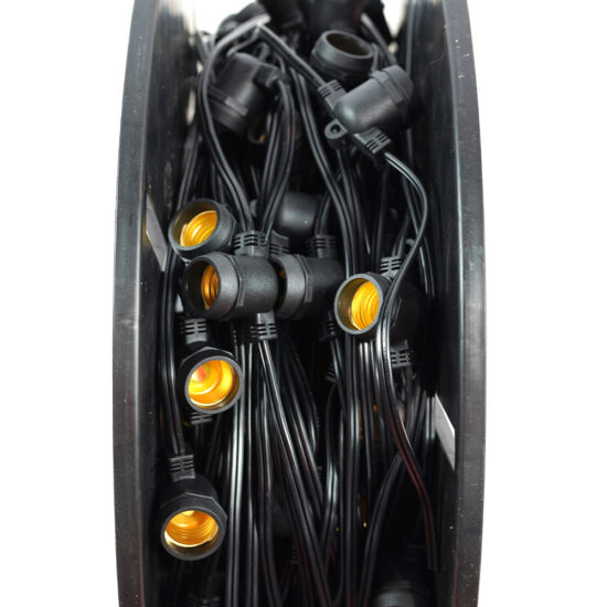 A commercial-grade outdoor string light reel featuring a black PVC-insulated wire. The spool contains numerous weather-resistant sockets with E26/E27 bases.