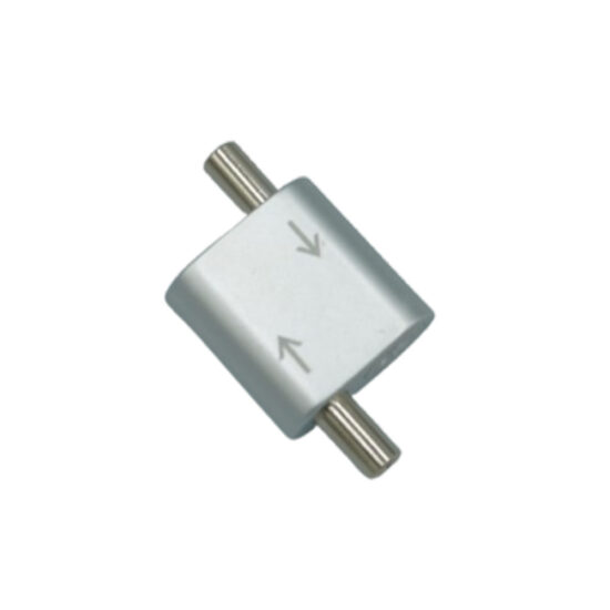 A small, silver-toned male-to-male electrical connector or adapter with a rigid rectangular body.