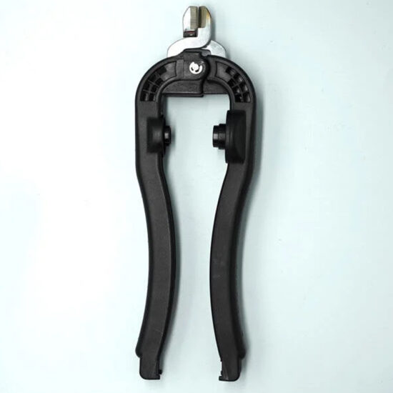 Dual-purpose tool with black plastic handles featuring a socket wrench for light bulbs and a wire/zip tie clipper at the head. Socket Wrench With Clipper