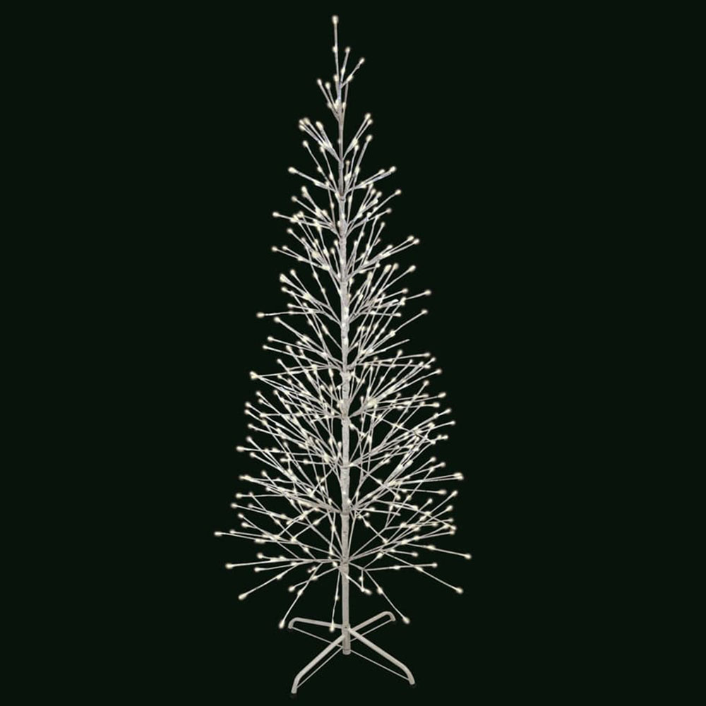 A striking decorative twig tree with a slender, vertical profile. The branches fan out from the center pole, and the entire structure is bathed in the soft glow of numerous warm white micro-lights.